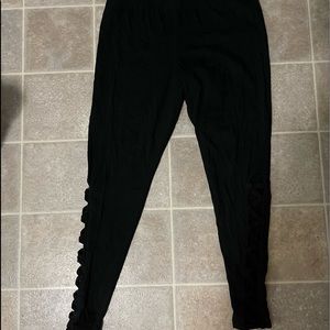 Torrid leggings with cross cross below the knee side peek a boo